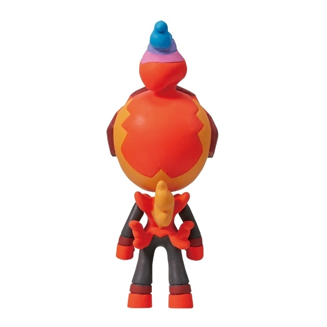  Rear view of a Combusken toy figure with orange body, black limbs, and a blue plume on its head.
