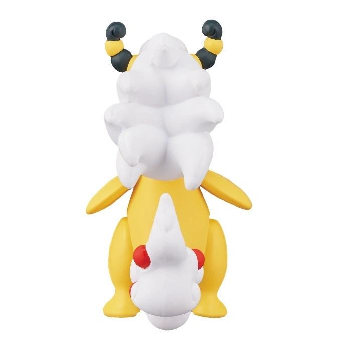  Rear view of a yellow and white toy figure with black and yellow horns.