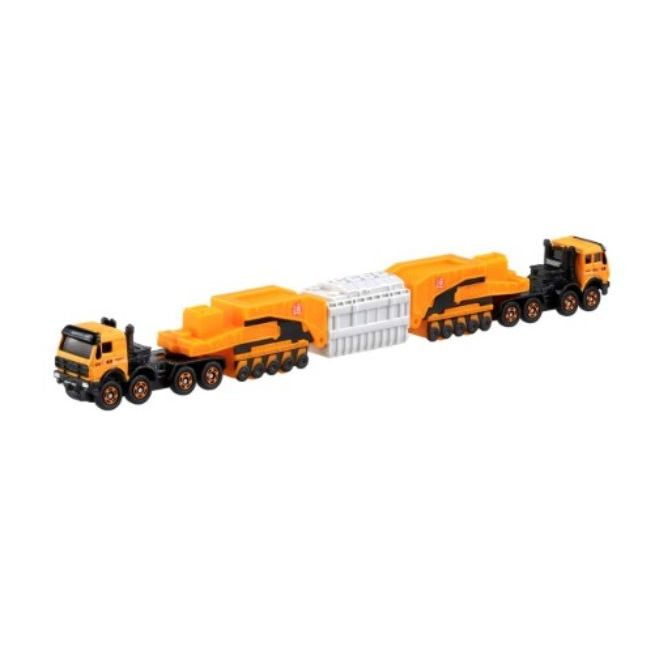 Toy heavy haul truck with orange and white modules. A miniature model for collectors.
