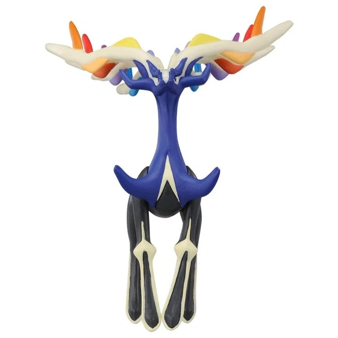  Xerneas toy figure with rainbow antlers, blue body, and black legs.