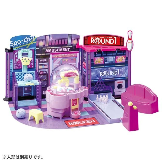  Round1 playset with basketball, crane game, and bowling alley, all in miniature.