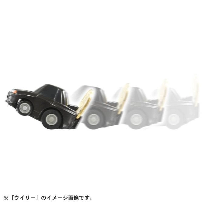  Black toy car doing a wheelie, shown in motion.