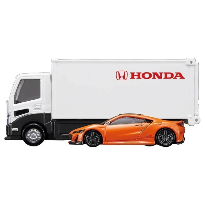  Honda truck carrying an orange NSX sports car toy.