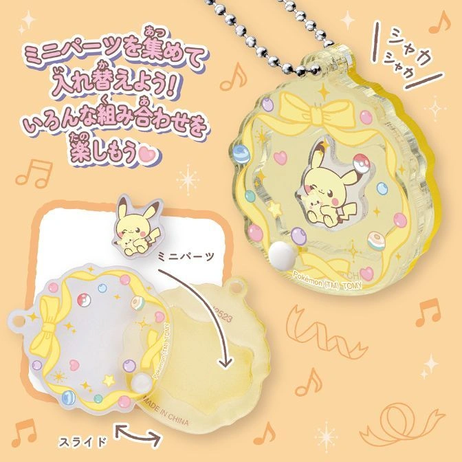  Pikachu charm toy with interchangeable parts. Slide open to customize.