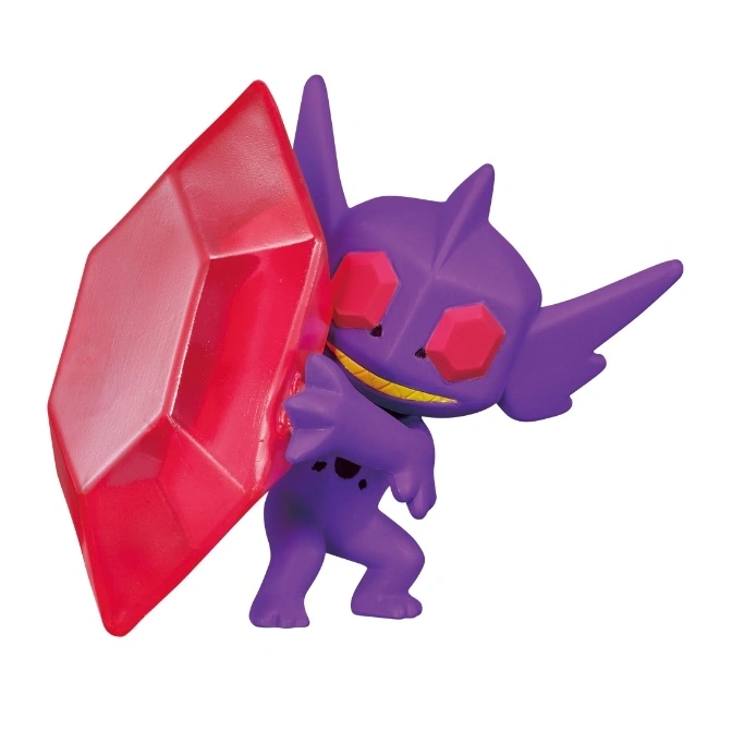  Purple Sableye toy holding a large red gem with a mischievous grin.