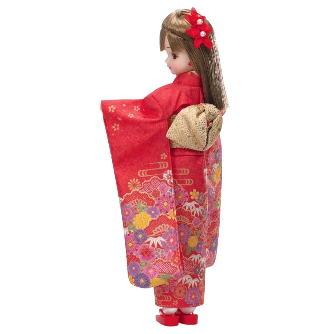  Doll in red kimono with floral pattern and red flower hair accessory.