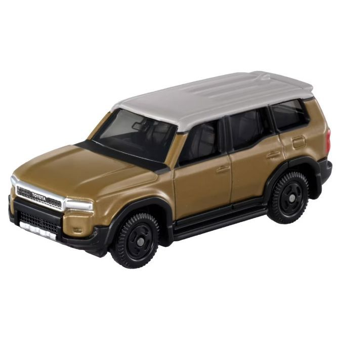 Toy Toyota SUV with a gold body and silver roof. Black wheels and trim.