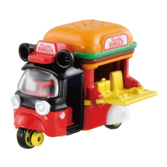 Toy food truck shaped like a burger on a red, black, and yellow three-wheeled vehicle.