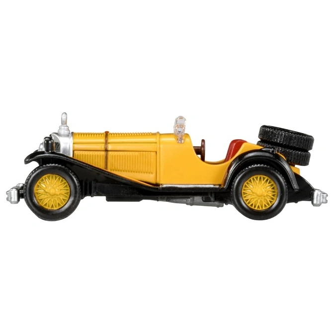  Yellow and black vintage toy car with spare tires on the back.