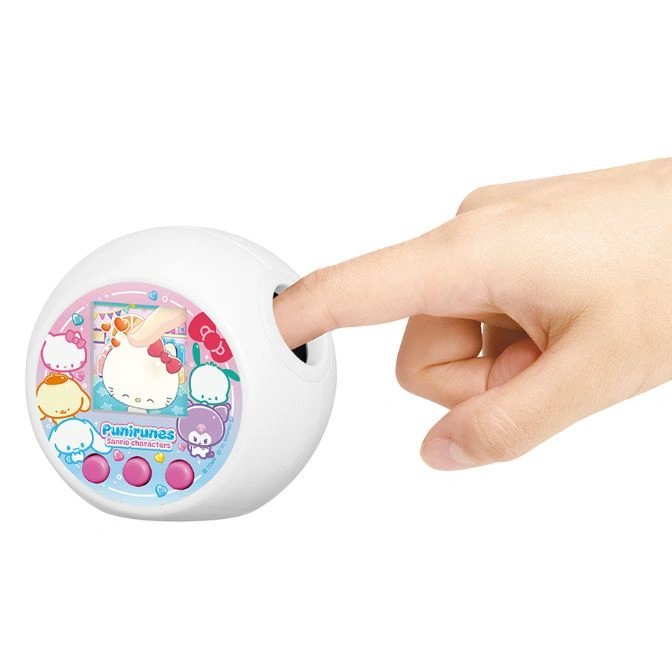  White Punirunes Sanrio toy with a finger poking the squishy hole.