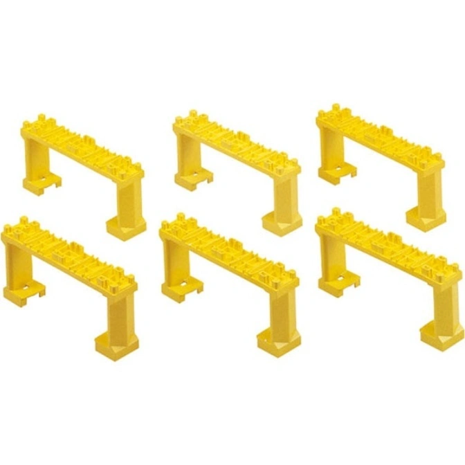 Six yellow toy bridges with rectangular bases and textured tops.