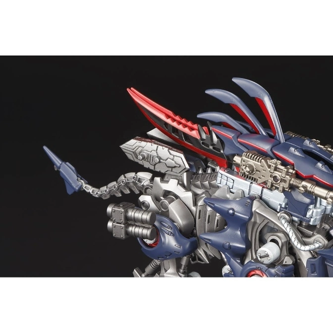  Detailed Zoid model with red blades, silver armor, and blue accents, showcasing intricate mechanical design.