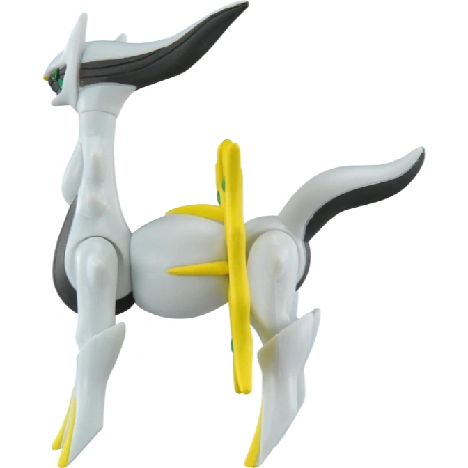  Arceus toy figure with yellow cross ring, white body, and black accents.