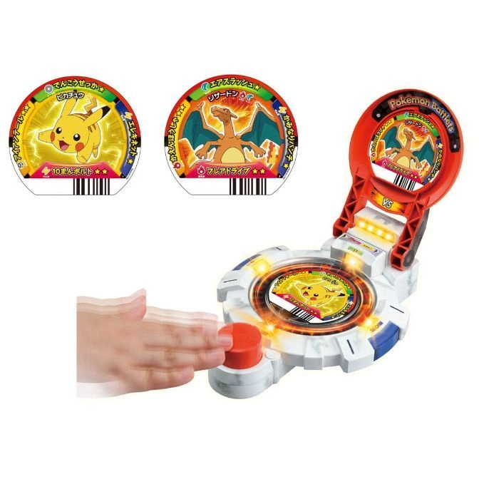  Pokémon Battlets toy with Pikachu and Charizard tokens, hand pressing button.