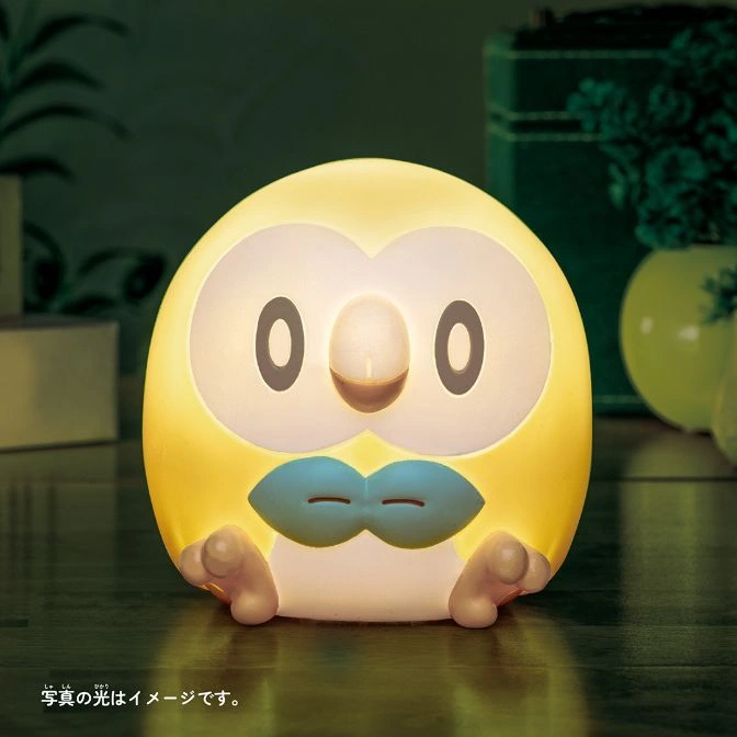  Glowing Rowlet night light with a yellow body, brown eyes, and a blue bow tie.