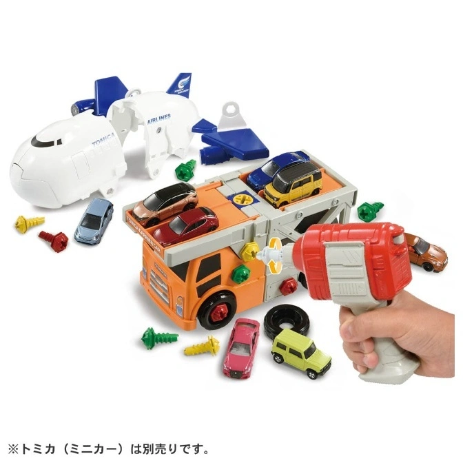Tomica build-it toy set with airplane, truck, cars, and power drill.