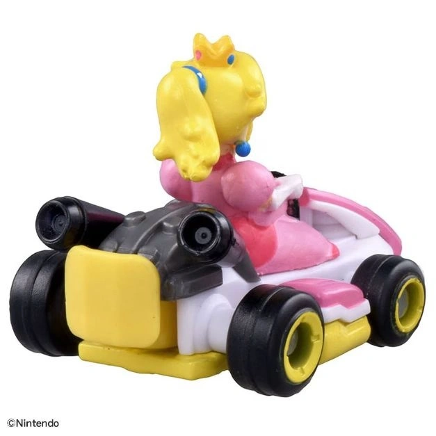  Princess Peach in her kart from Mario Kart. Toy vehicle with black tires and yellow accents.