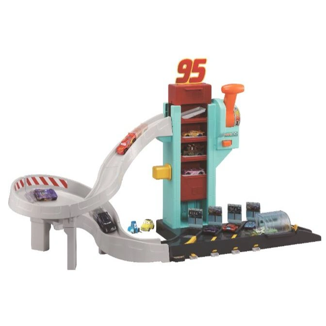 Cars playset with a ramp, garage, and several toy cars. The number 95 is displayed on top.
