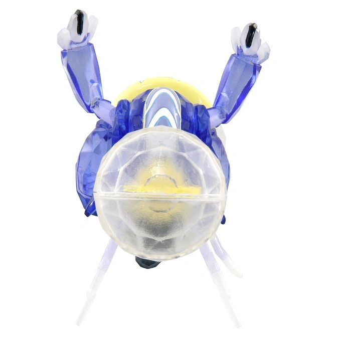  Blue and clear plastic toy bug with raised arms and visible internal mechanisms.