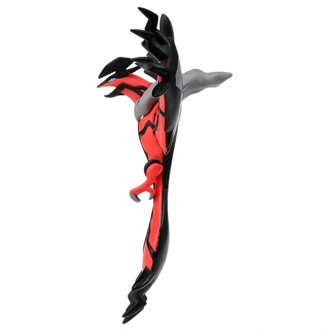  Red and black Yveltal Pokémon toy figure with wings extended.