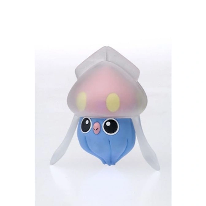 Cute Inkay toy with a pink and clear head, blue body, and big eyes.