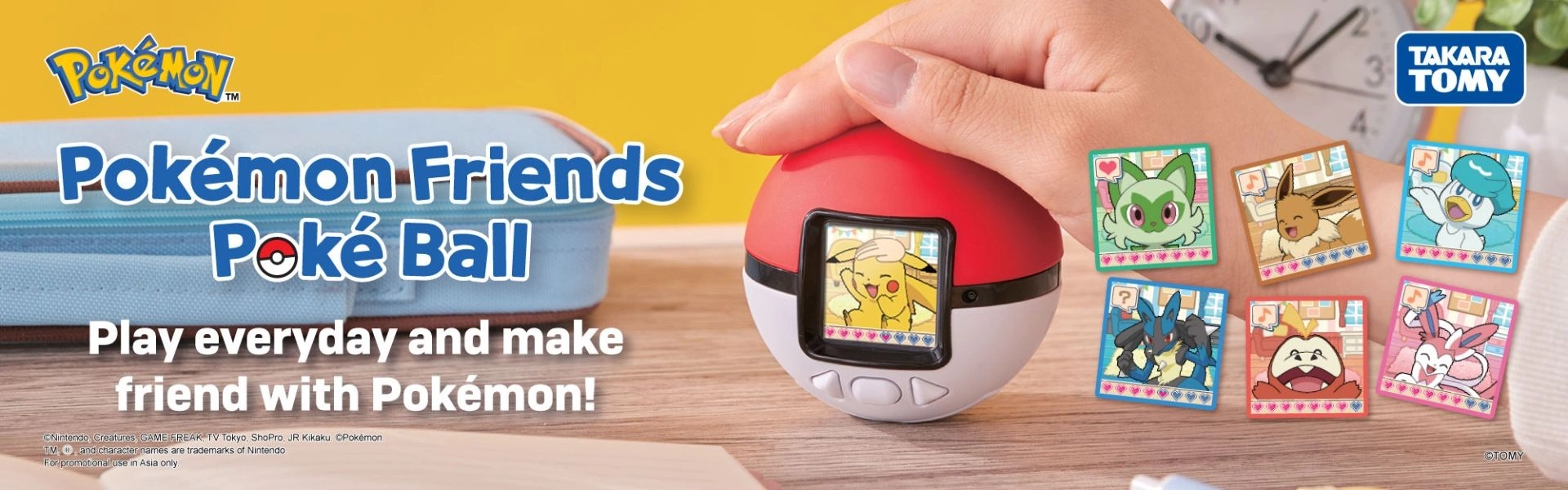 Pokémon Friends Poké Ball promotional banner showing a handheld Poké Ball device with Pikachu on screen and collectible Pokémon character cards beside it.