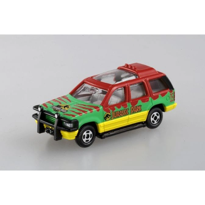 Jurassic Park toy SUV with green, red, and yellow paint scheme.