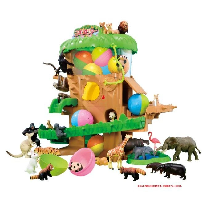 Toy jungle treehouse with various animal figures, including lions, gorillas, and elephants.
