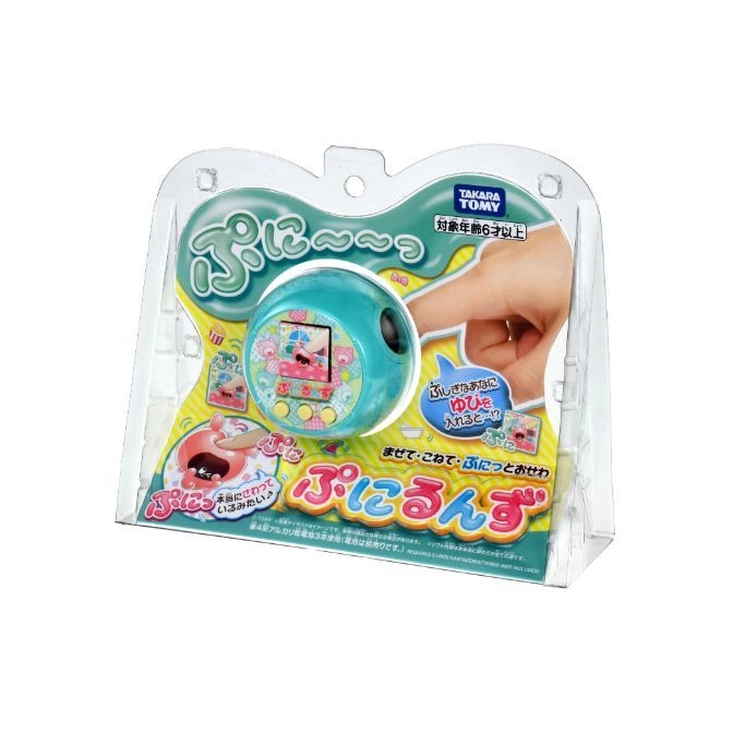  Takara Tomy Punirunes handheld virtual pet toy in packaging. Features a screen and button controls.