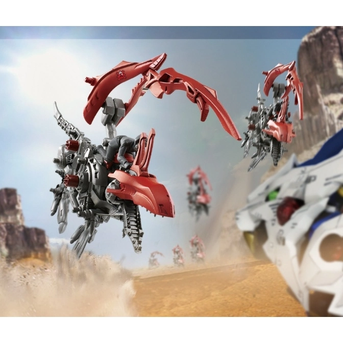  Red and gray Zoids toy in a desert setting, with multiple units in the background.