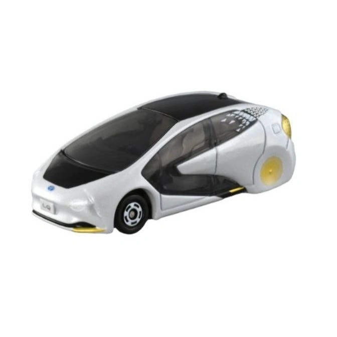 Silver and black toy Toyota LQ car with futuristic design and visible interior.