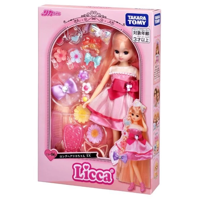  Licca doll in pink dress with accessories. Ages 3+. Boxed toy.