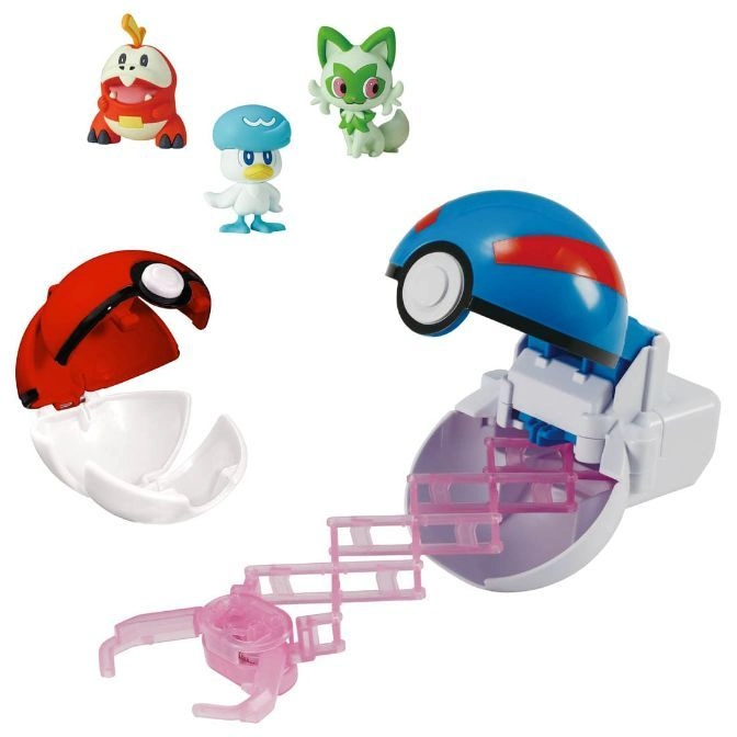 Pokémon toy set with Sprigatito, Fuecoco, Quaxly figures, and Poké Ball claw machine.