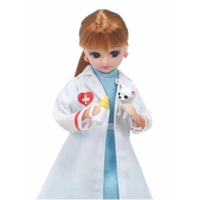  Doll vet in lab coat holds baby bottle and toy chihuahua.