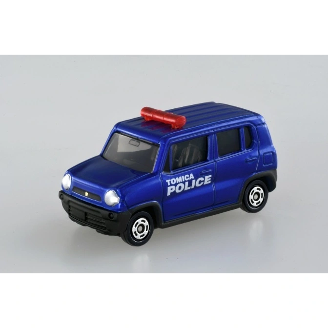  Blue Tomica toy police car with red light bar on top.