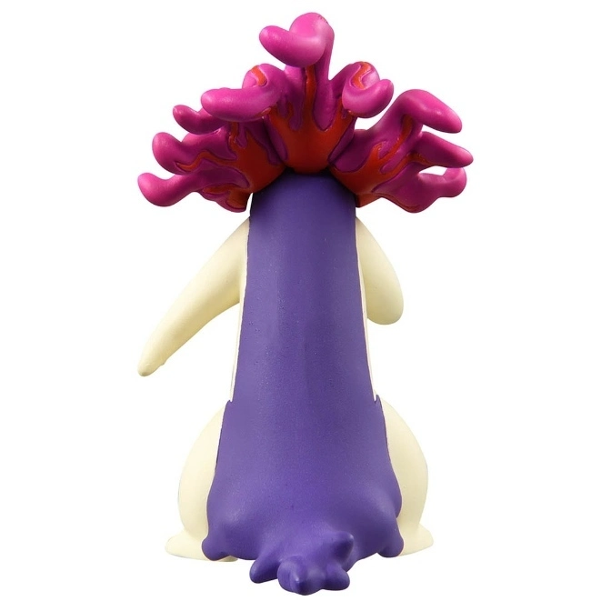  Typhlosion toy figure with purple mane and cream body.