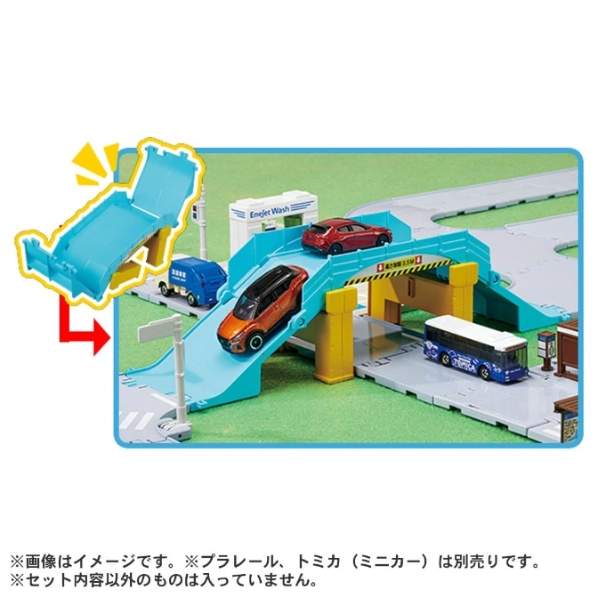  Toy car playset with bridge, ramp, and vehicles, including a bus, cars, and a car wash.