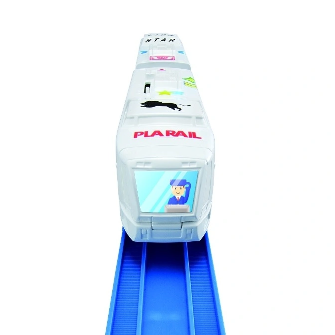  White Plarail toy train on blue tracks with driver visible in the front window.