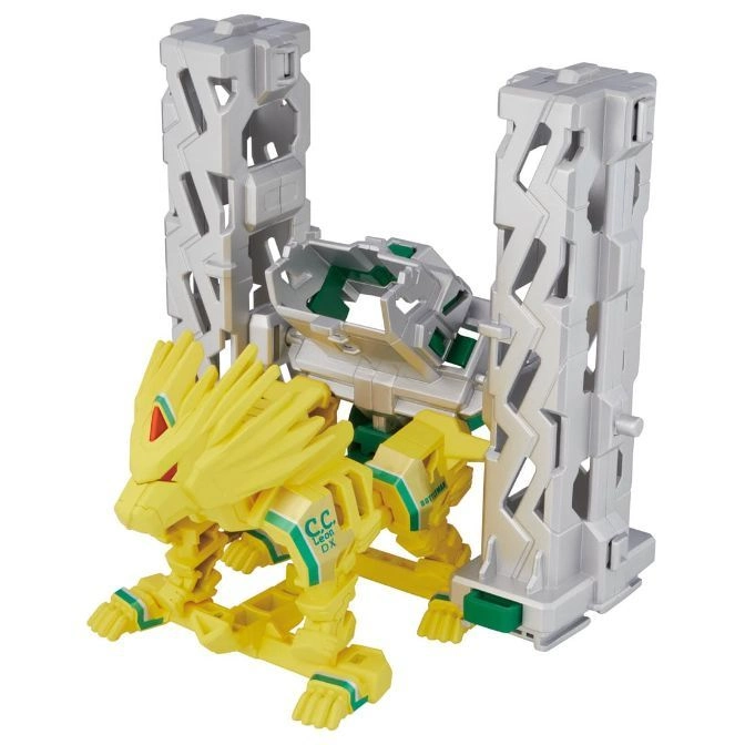  Yellow lion robot toy with silver frame. "C.C. Leon DX" and "BOTSMAN" are printed on it.
