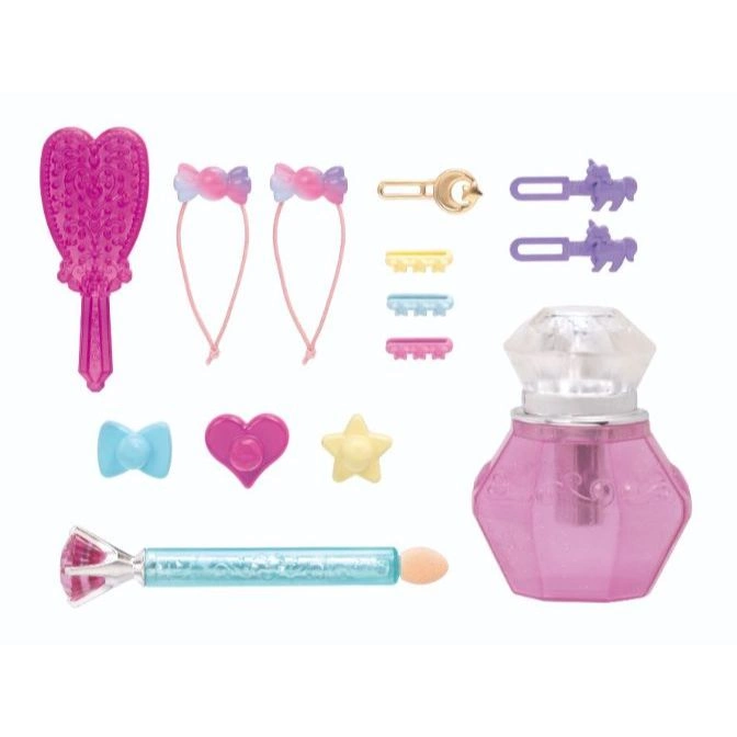  Toy beauty set with a brush, hair ties, perfume bottle, and other accessories.