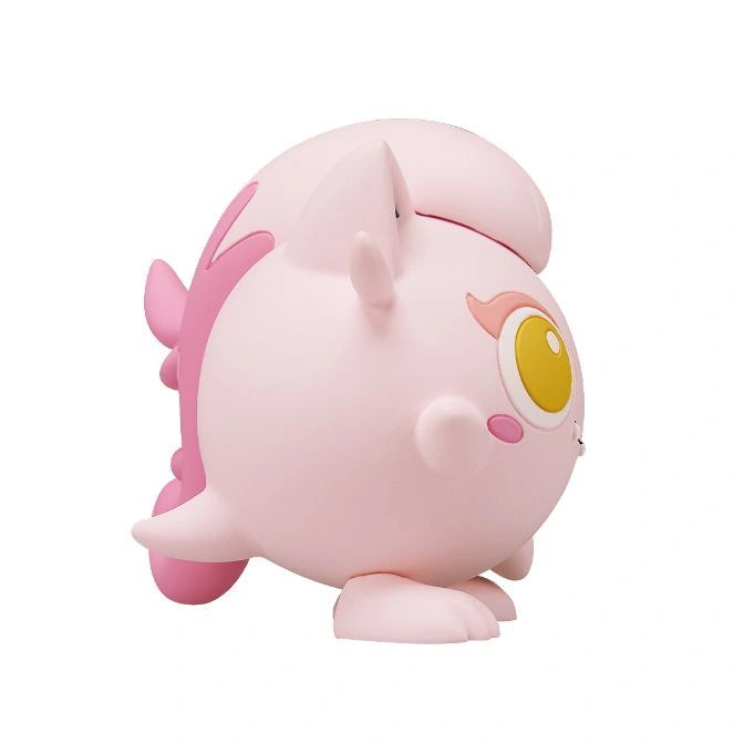  Pink unicorn-like toy with yellow eyes and a rounded body.