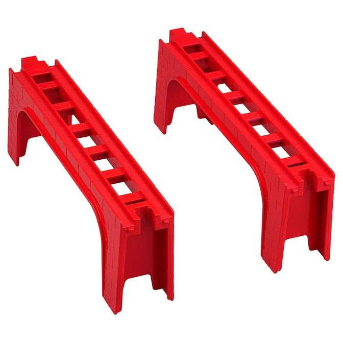 Two red toy train track bridges stand side-by-side on a white background.