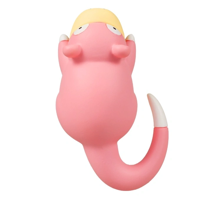  Pink Slowpoke toy with yellow head and curled tail, lying on its back.