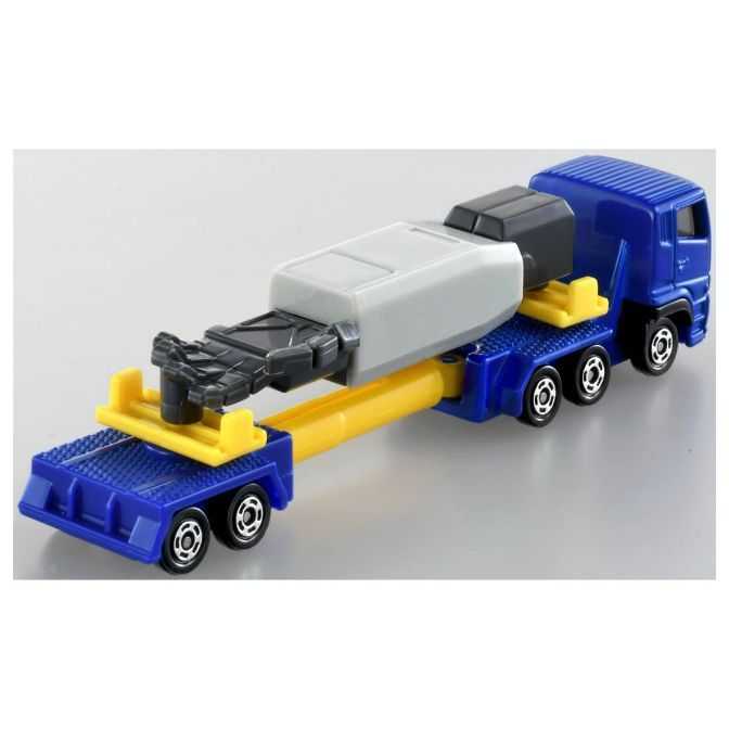  Blue toy truck with yellow trailer and gray/black load.
