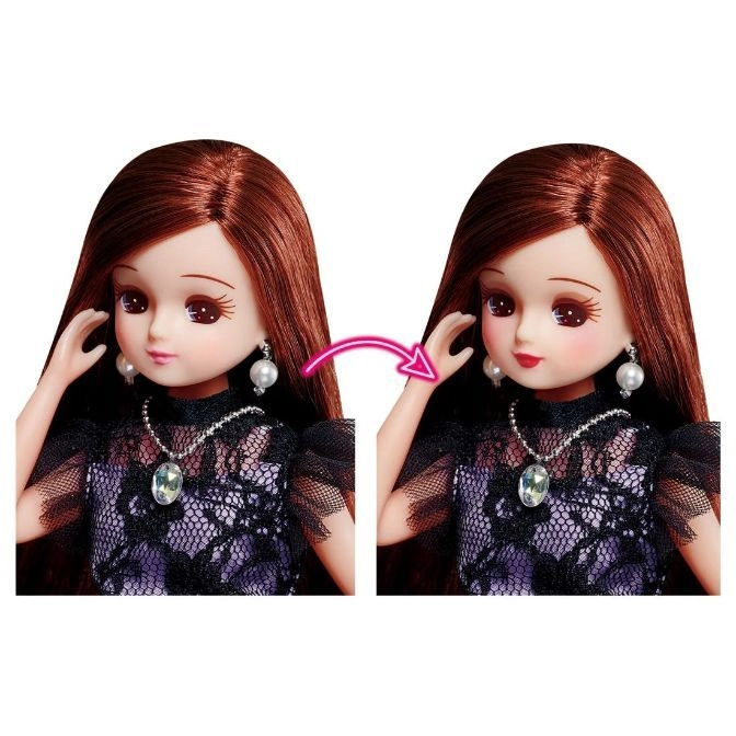  Fashion doll with brown hair, wearing a black lace dress, pearl earrings, and a necklace with a large pendant.
