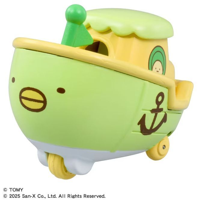 Avocado-themed toy boat with wheels and anchor detail.