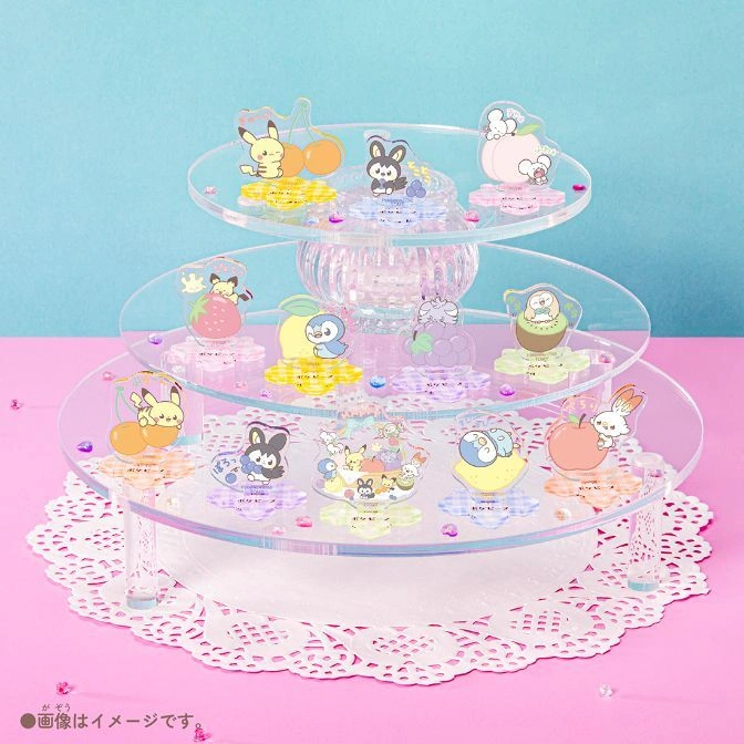  Tiered display stand with Pokémon character acrylic stands on a pink and blue background.