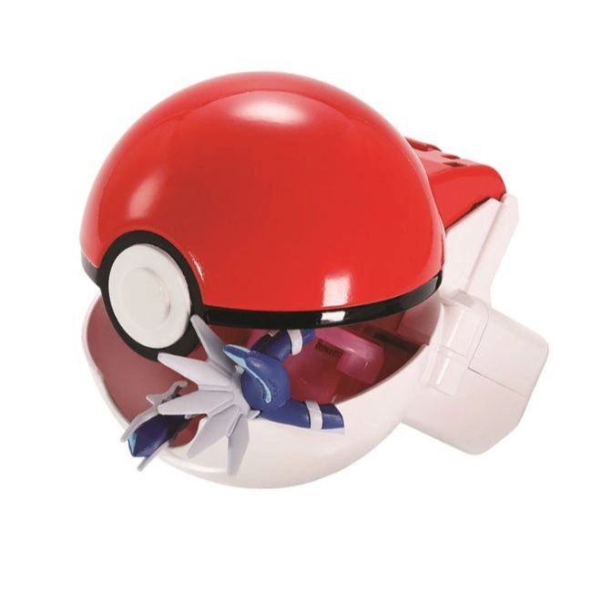  Red and white Poké Ball toy with a blue and white figure inside.
