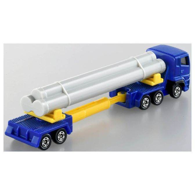  Blue toy truck carrying gray pipes on a yellow extender, showcasing a miniature transport vehicle.