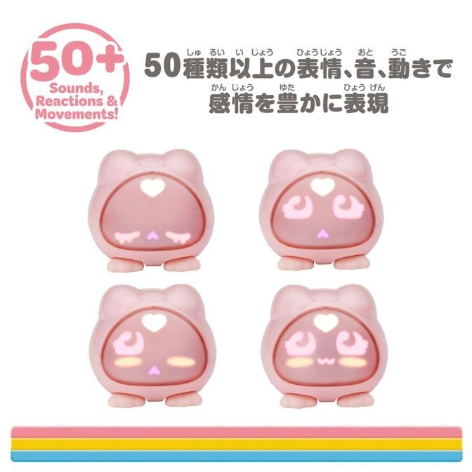  Pink interactive toy with 50+ sounds, reactions, and movements. Expressive face with heart and emoji-like features.